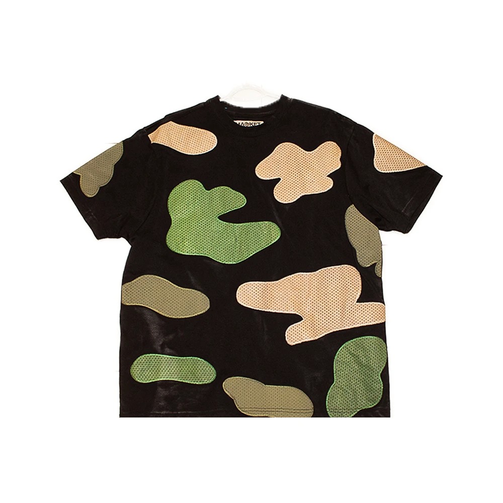 Black T-shirt with an oversized green and tan pattern